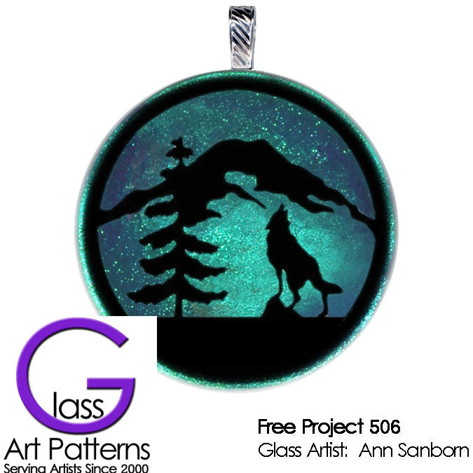 Example Fused Glass Penant: South West Wolf howling at the moon on a mountain.