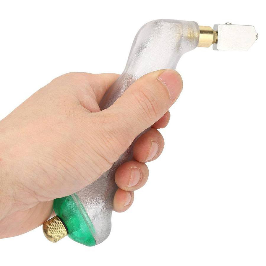 Holding a Toyo Acrylic Everyday Pistol Grip Cutter